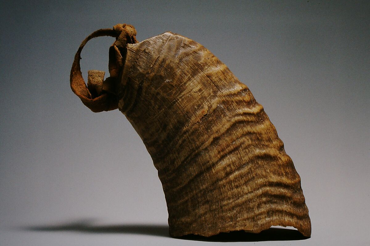 Bell, Rocky Mountain sheep horn, rawhide, stone, Native American (Moqui) 