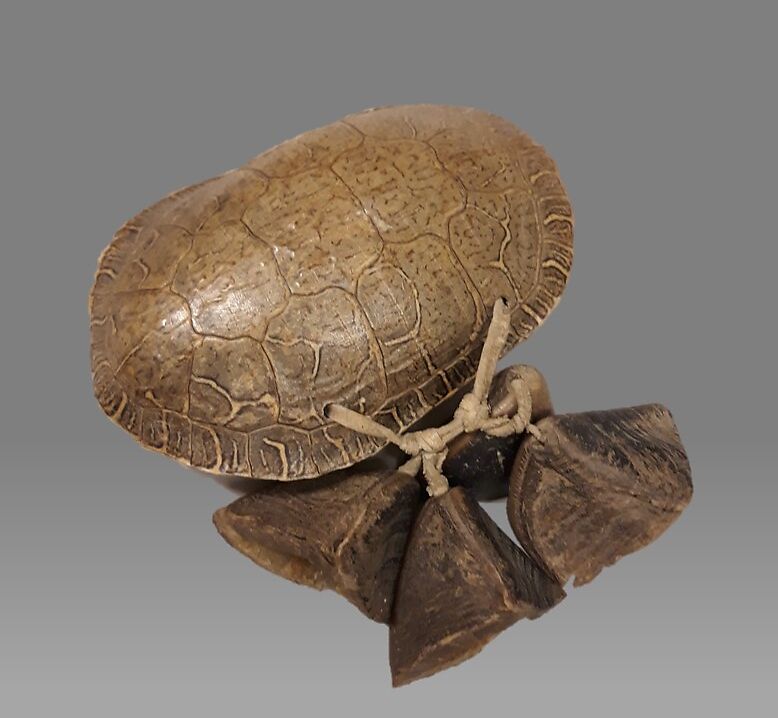 Yung-Uh-Sho-Na (rattle), Turtle shell, buckskin, deer hooves, Native American (Hopi) 