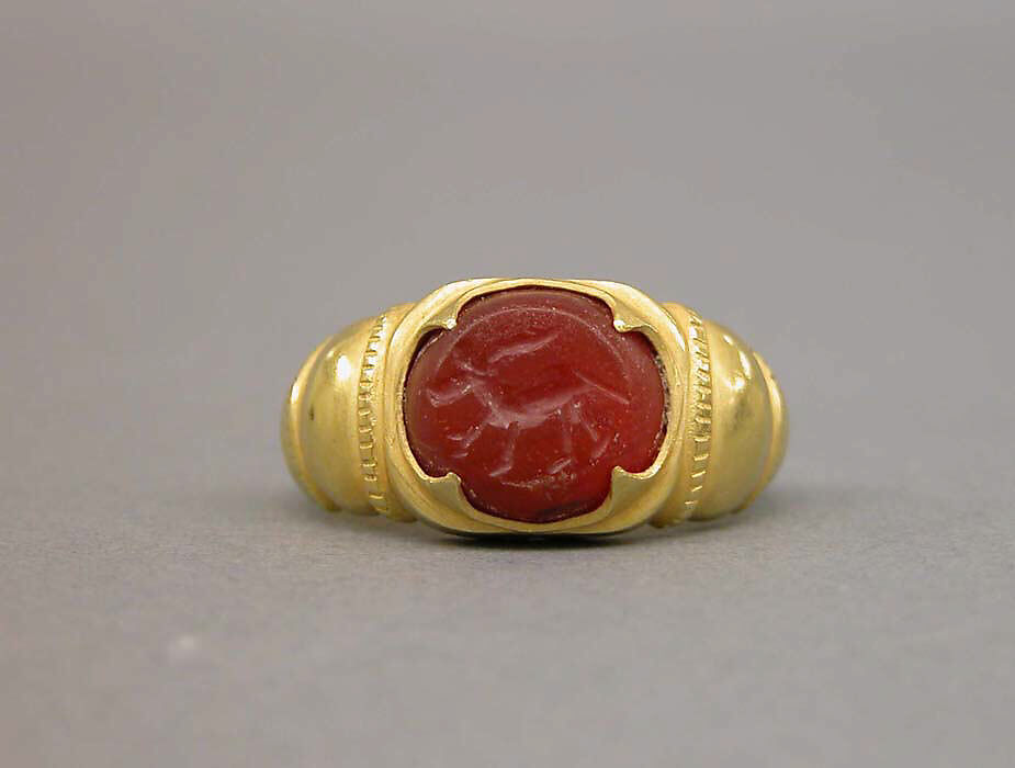 Ring with Ridged Segments and Inset Red Stone, Gold with red stone, Indonesia (Java)