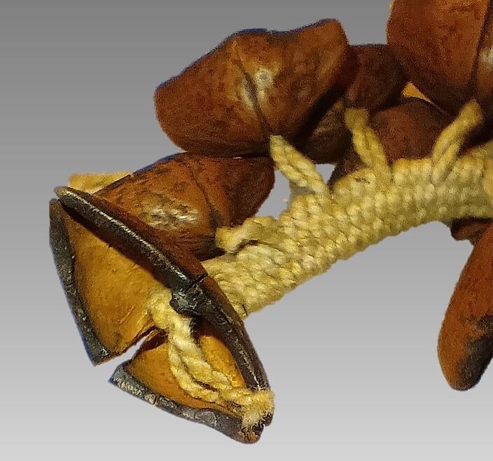 Strung Rattle, nut shells or fruit pits, cotton cord, Native American (Guyanese - Demerara)