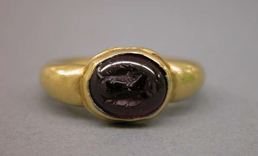 Ring with Dark Red Inset Oval-Shaped Stone, Gold with red inset stone, Indonesia (Java)