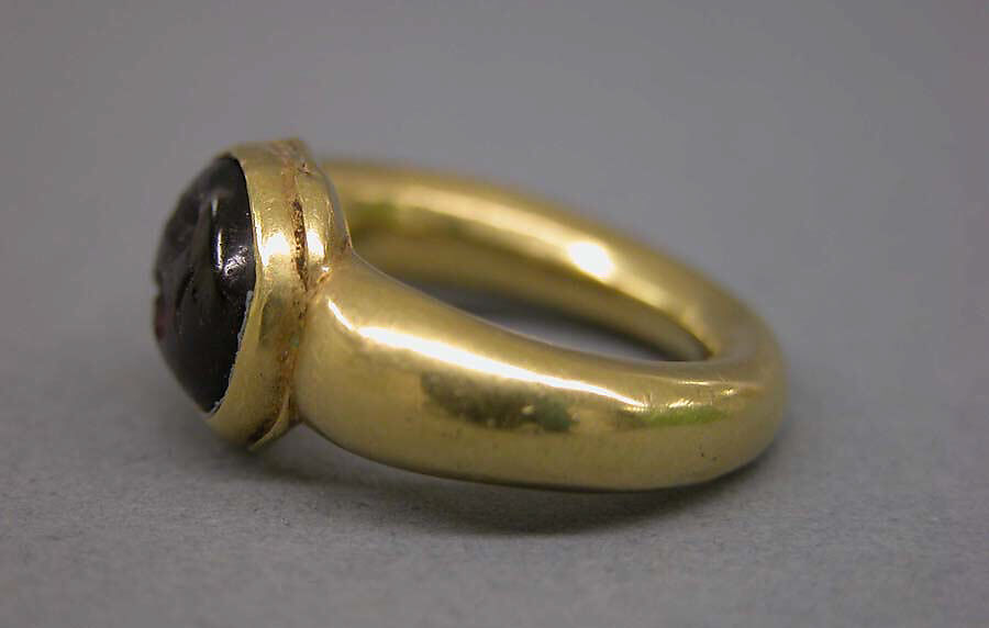 Ring with Dark Red Inset Oval-Shaped Stone, Gold with red inset stone, Indonesia (Java)