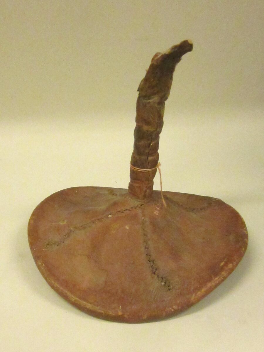 She-Shee-Quoi, Wood, rawhide, pebbles, wood fiber, Native American (Mandan)