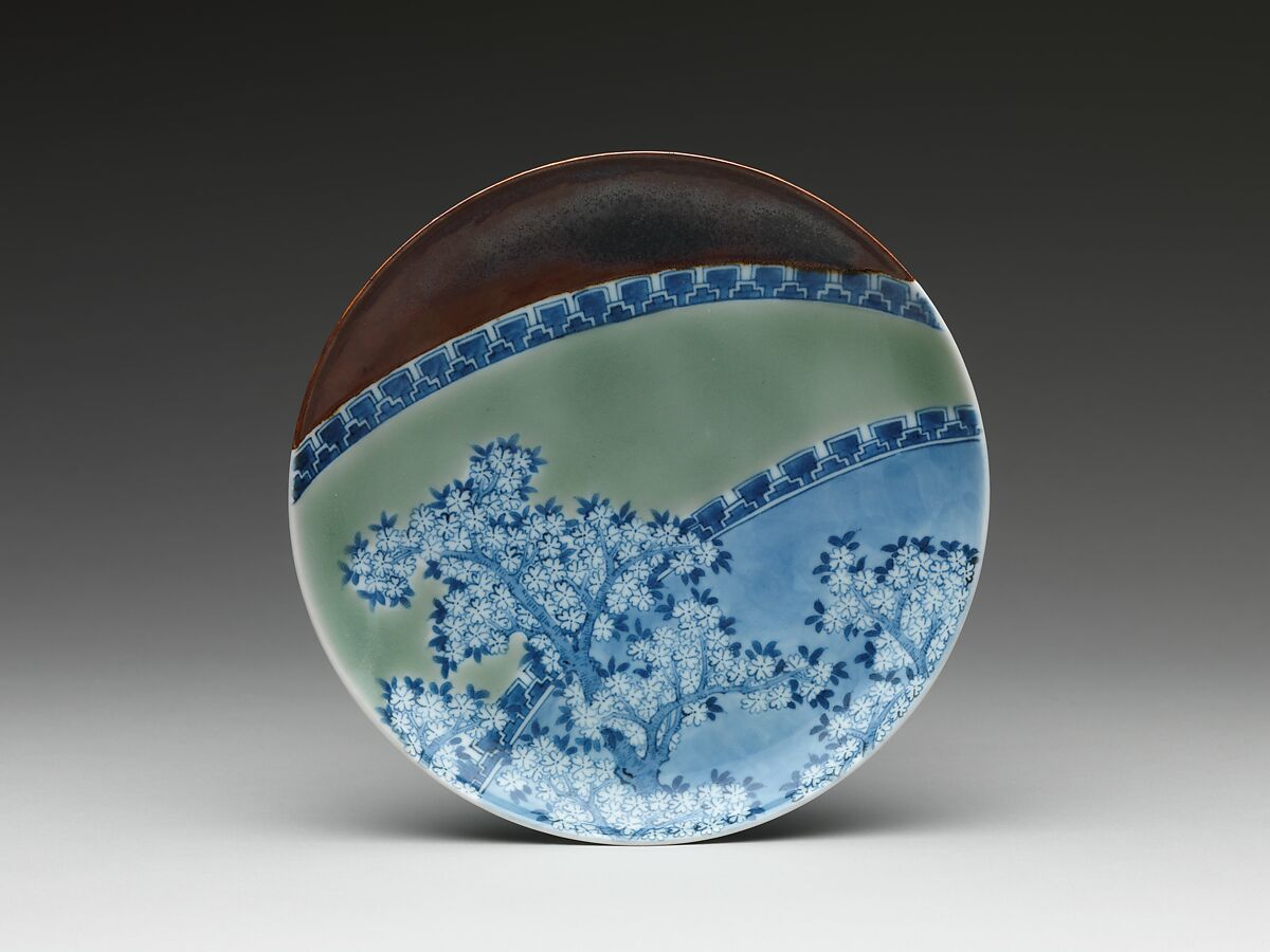 Dish with Cherry Blossoms and Textile Curtains, Porcelain with celadon glaze, partial brown glaze, and underglaze blue decoration (Hizen ware, Nabeshima type) , Japan 