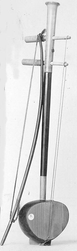 Saw U, Coconut shell, ivory, wood, twine, Thai