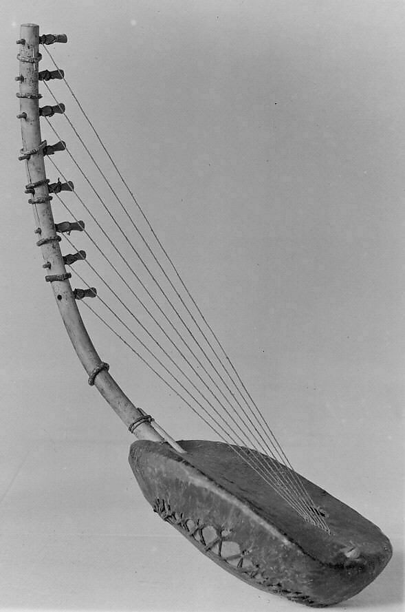 Ennanga (harp), Wood, skin, gut strings, parchment, Ugandan 