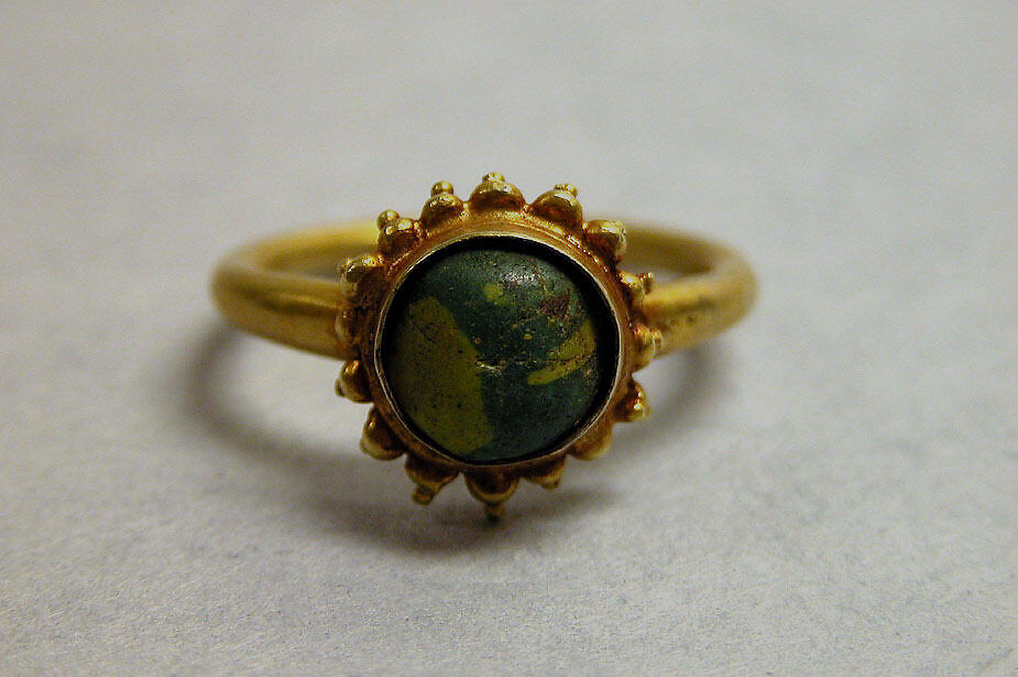 Ring with Green Stone in Circular Mount, Gold with green stone, Indonesia (Java) 