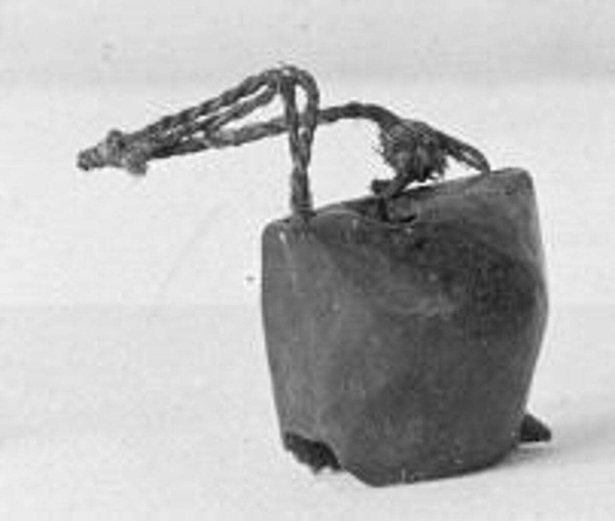 Pocketbook-shaped rattle, Metal, Bakwe, Grebo or Kru people