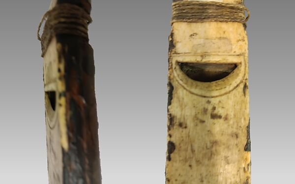 Sk-A'Na (stopped pipe), wood (cedar or spruce), walrus ivory?, resin, cord, Native American (Haida)