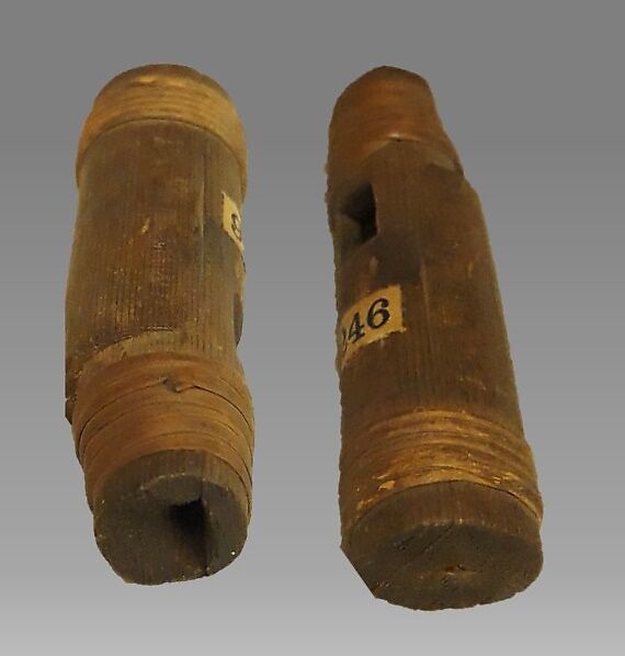 Sk-A'Na (stopped pipe), wood, Native American (Northwest Coast)