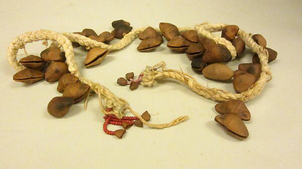 Strung Rattle, cotton cord, red & lavender glass beads, nut or fruit shells, Native American (Guyanese: Demerara) 