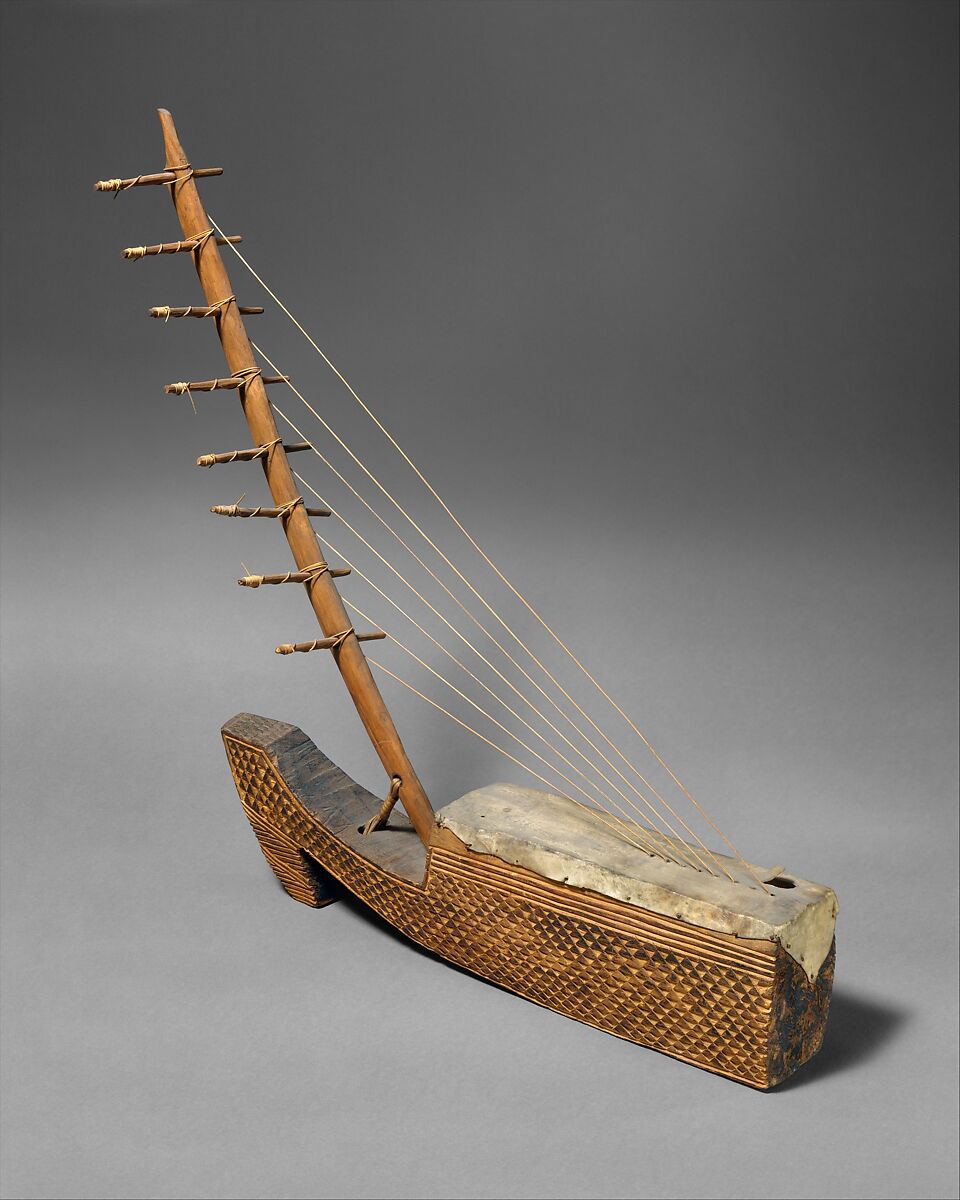 Ngombi (arched Harp), Wood, skin, vegetable fiber, leather, Fang/Kele people 