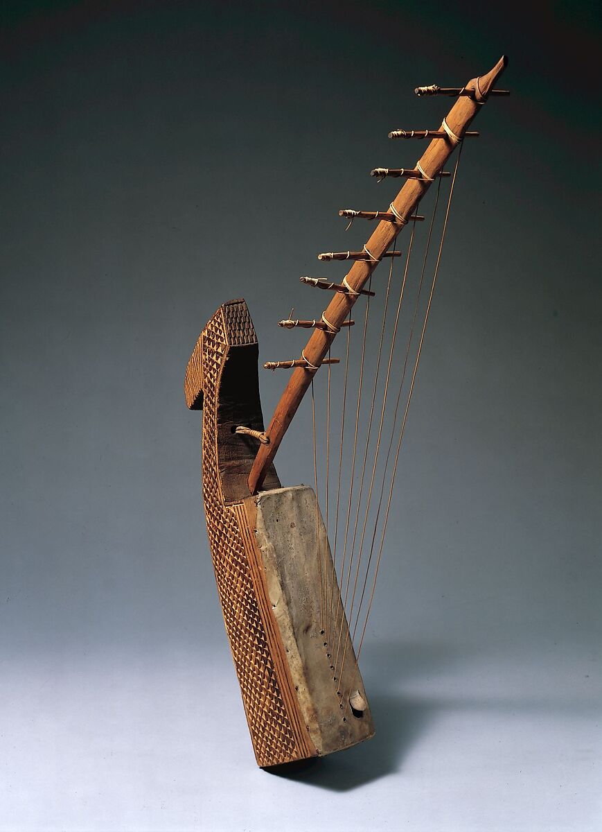 Ngombi (arched Harp), Wood, skin, vegetable fiber, leather, Fang/Kele people