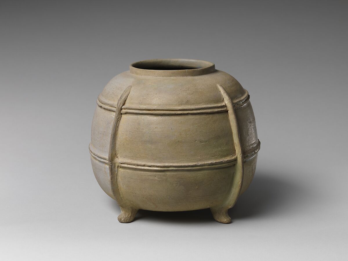 Four-Legged jar, Stoneware with green glaze and relief decoration (Sanage ware), Japan 