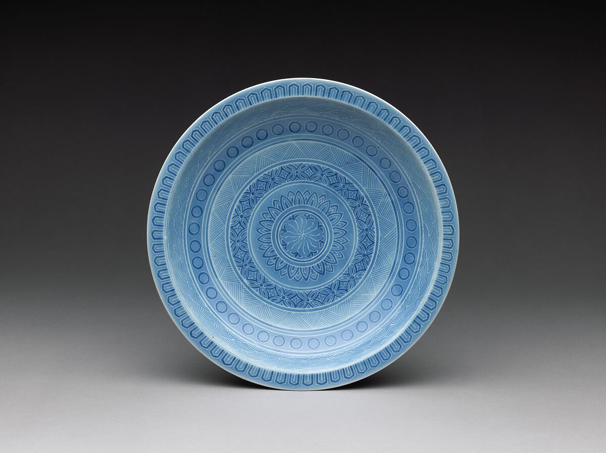 Dish with Bands of Geometricized Patterns, Porcelain painted in underglaze blue with comb pattern around the foot  (Nabeshima ware), Japan 