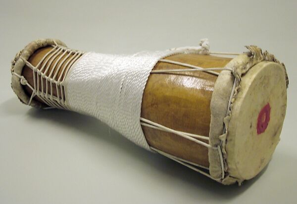 Batá, Brandon Rosser (American, active New York, late 20th century), Sweet maple, polyurethane finish, brass and copper bells, nylon, steel bolts, jet bead, deer skin heads, golden oak stain, red clay, American