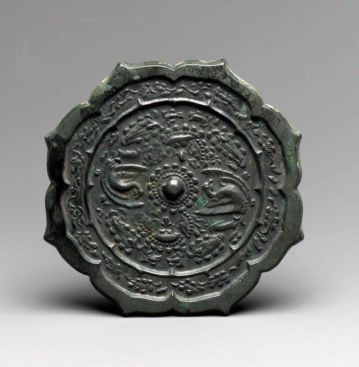 Mirror decorated with phoenixes and flowers, Bronze, Korea 