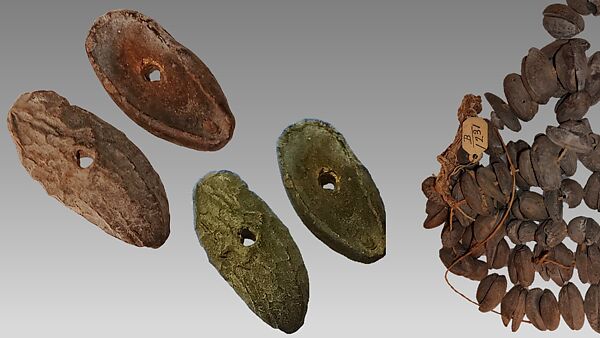 Rattle, Laurel seeds, plant fiber, cord, Native American (Peruvian)