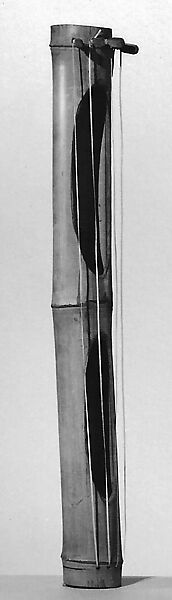 Tube zither, a bamboo tube with two oblong openings on one side between the nodes; four fibre strings fastened to wood pegs inserted at one end pass through holes at the other., Philippine 