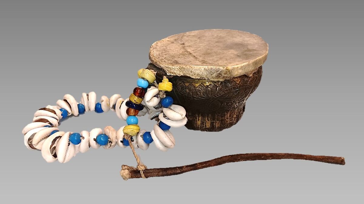 Baz, metal, skin, bead, cowrie shell, and cord, Egyptian 