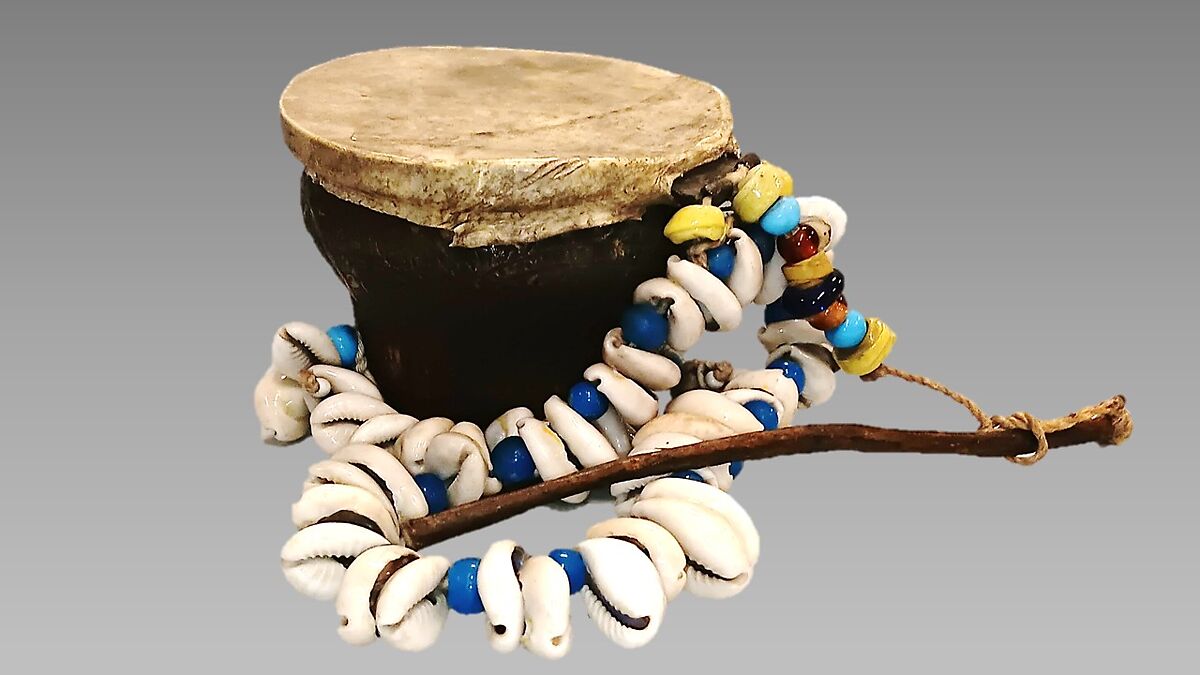 Baz, metal, skin, bead, cowrie shell, and cord, Egyptian