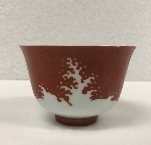 Cup with design of waves