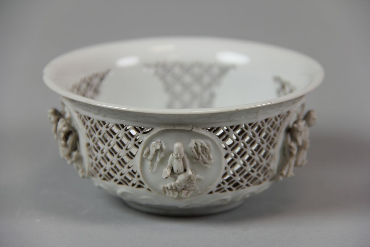 Cup, Porcelain with low- and high-relief and pierced decoration, in the biscuit and under a clear glaze, China