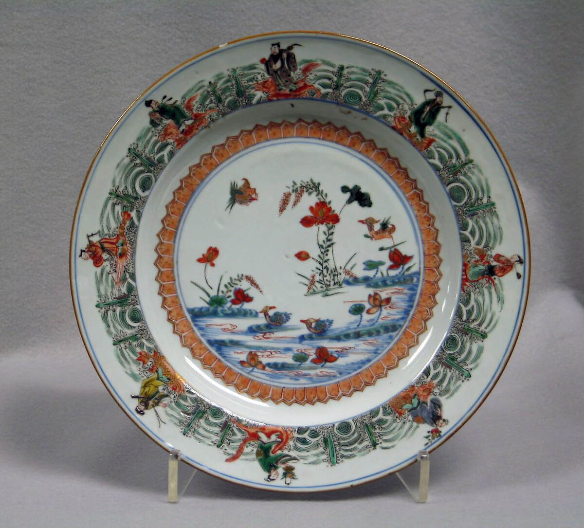 Plate with lotus pond and Daoist immortals, Porcelain painted in underglaze blue and overglaze famille verte enamels, China 