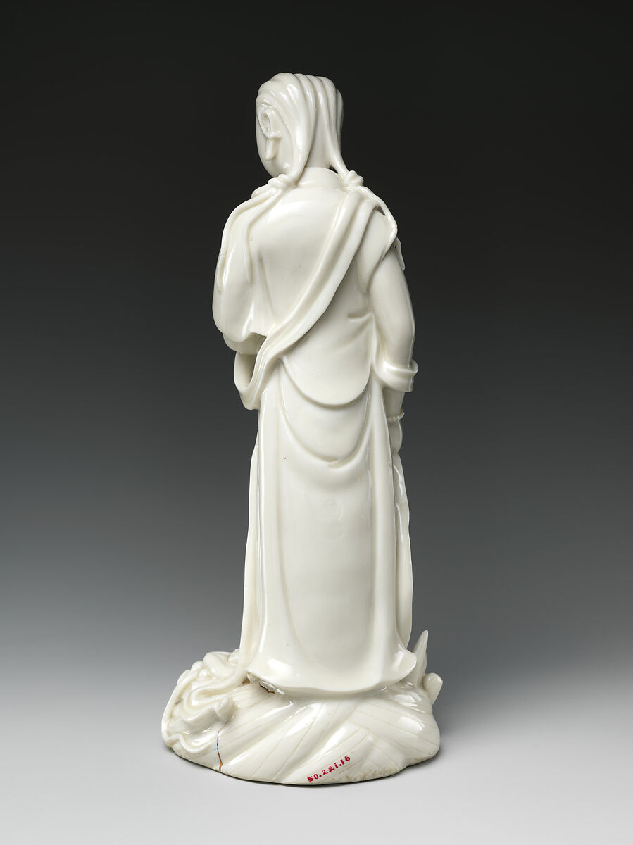 Bodhisattva Guanyin standing on a dragonfish, Porcelain with ivory glaze (Dehua ware), China