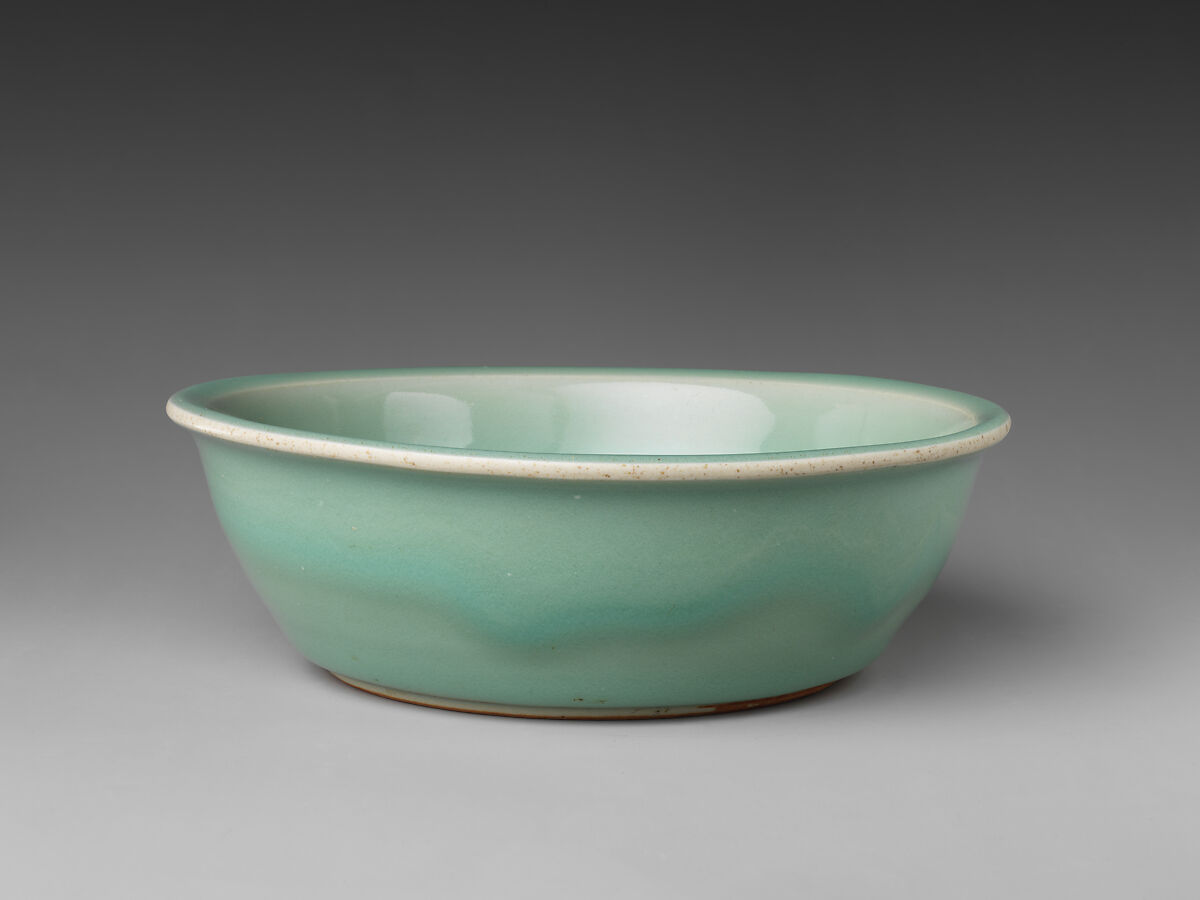 Dish with relief decoration of fish, Stoneware with celadon glaze and biscuit relief (Longquan ware), China