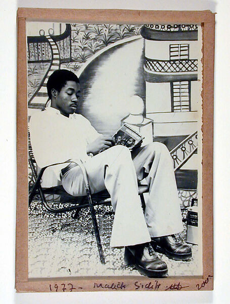 Portrait of Man Reading, Malick Sidibé (Malian, Soloba 1936–2016 Bamako), Gelatin silver print in original frame of glass, tape, cardboard, string 