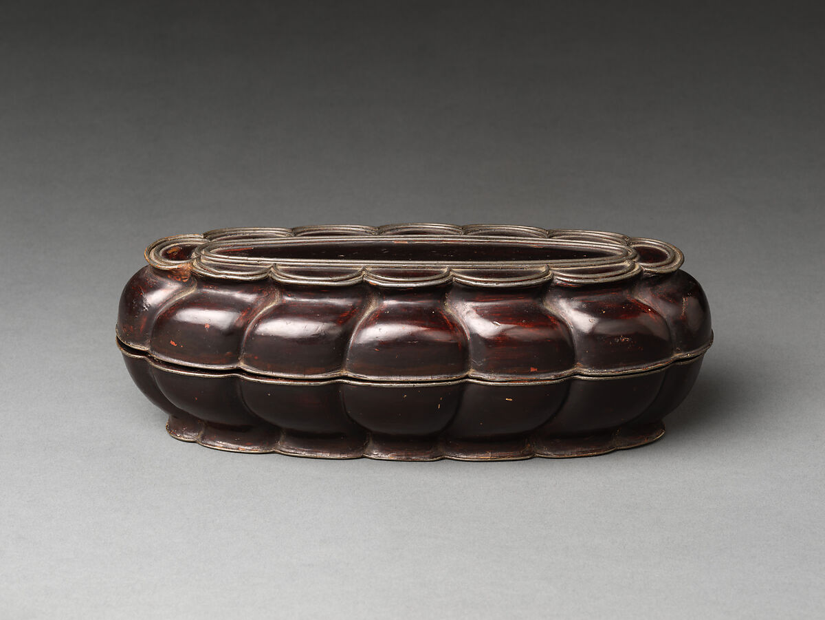 Twelve-lobed covered box, Black lacquer trimmed in pewter, China