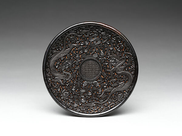Saucer with two chi dragons, Carved black lacquer, China