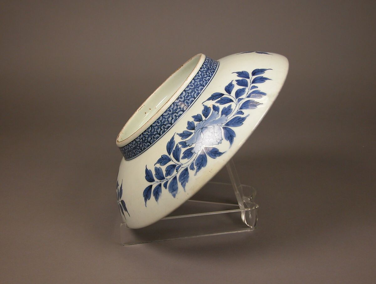 Large Dish (Shakuzara) with Cherry Blossoms and Fence, Porcelain with cobalt blue under transparent glaze and polychrome enamels over the glaze (Hizen ware, Nabeshima type), Japan