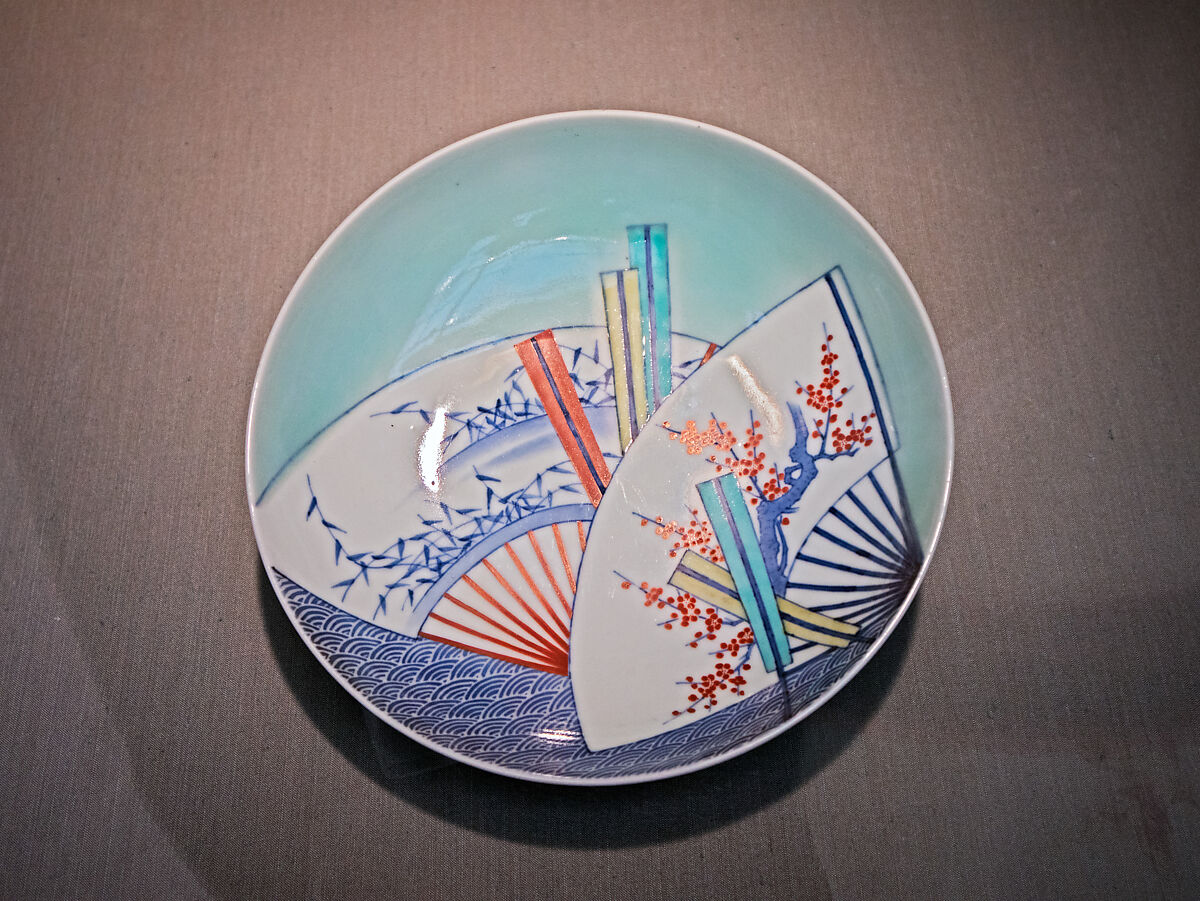 Dish with Floating Fans with Bamboo Grass (Sasa) and Plum Motifs, Porcelain with celadon glaze, painted with cobalt blue under and polychrome enamels over a transparent glaze (Hizen ware, Nabeshima type), Japan 