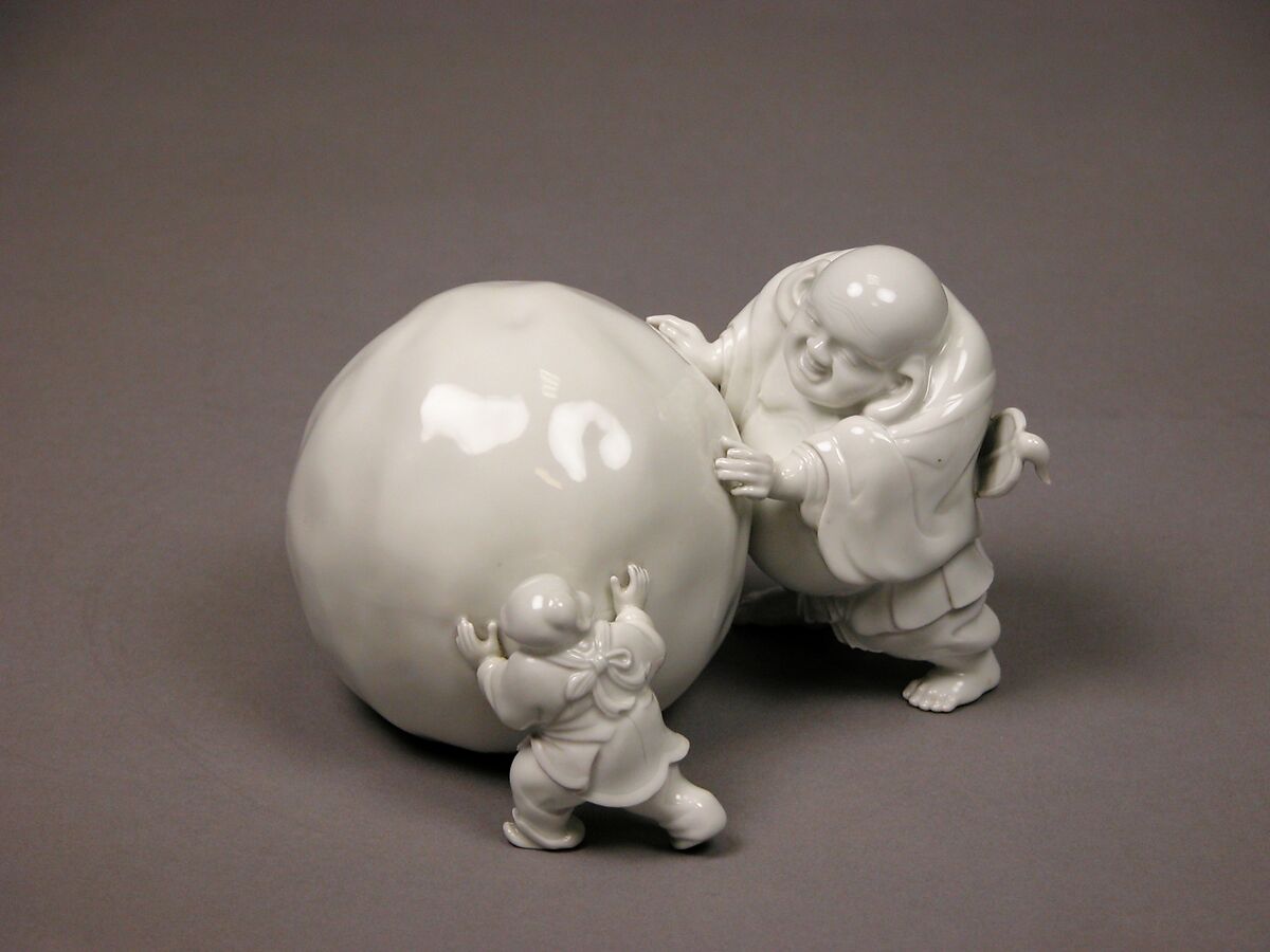 Snowball Pushed by Hotei and a Child, White porcelain (Hirado ware), Japan 