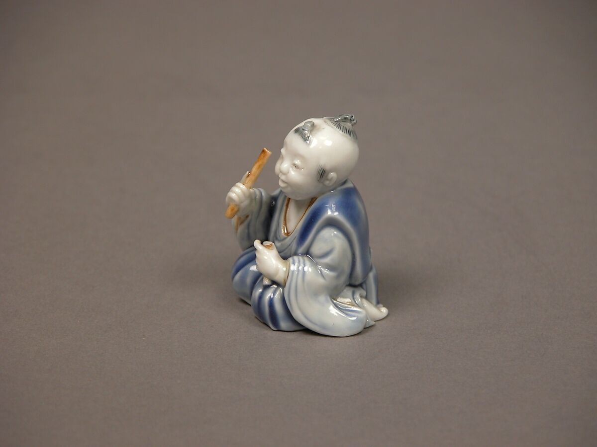 Chinese child with musical instrument, Porcelain with underglaze blue and iron decoration (Hirado ware), Japan