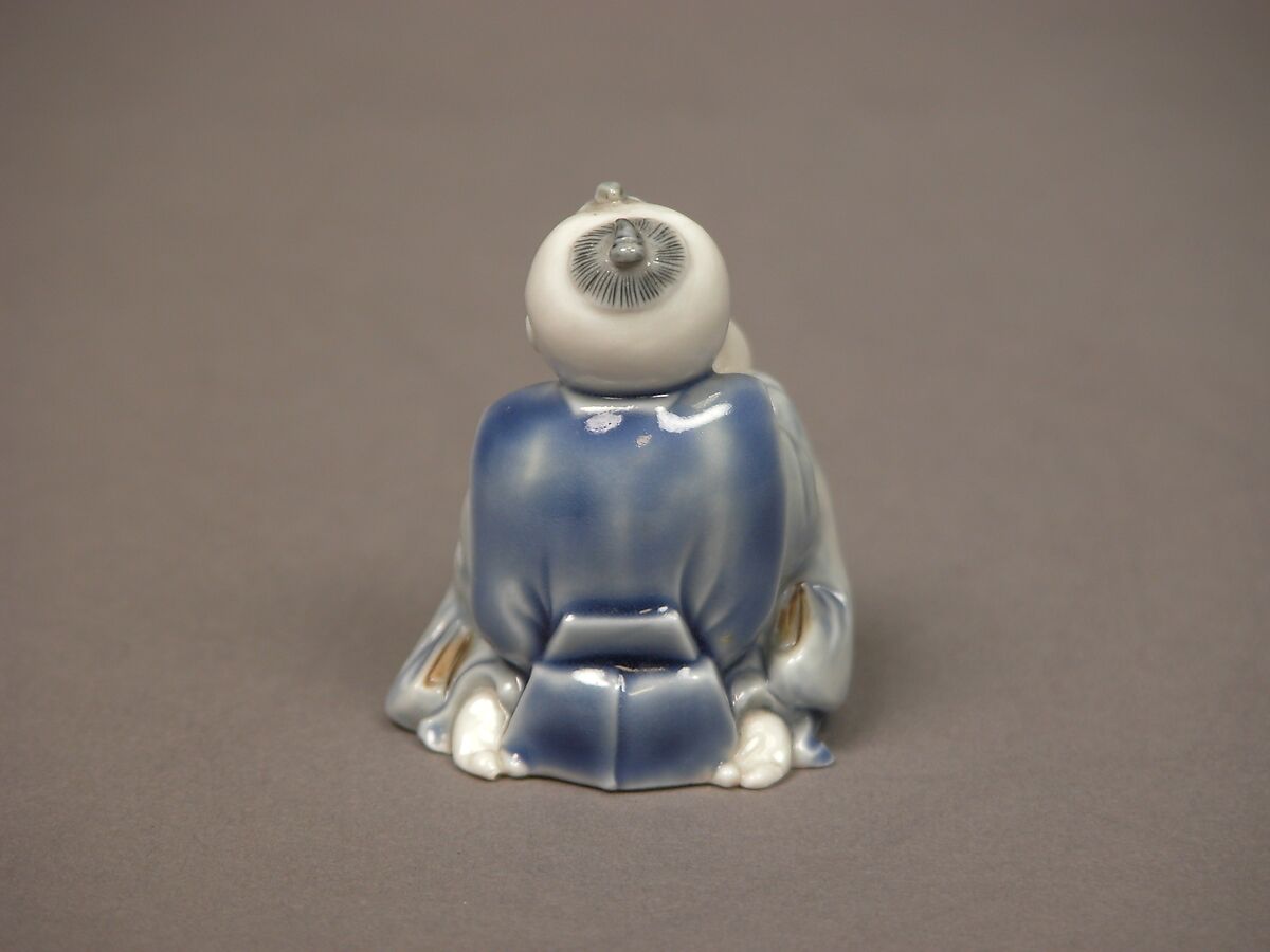 Chinese child with musical instrument, Porcelain with underglaze blue and iron decoration (Hirado ware), Japan