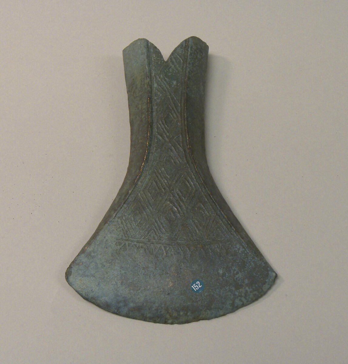 Swallowtail Hafted Ax with Diamond Pattern, Bronze, Indonesia 