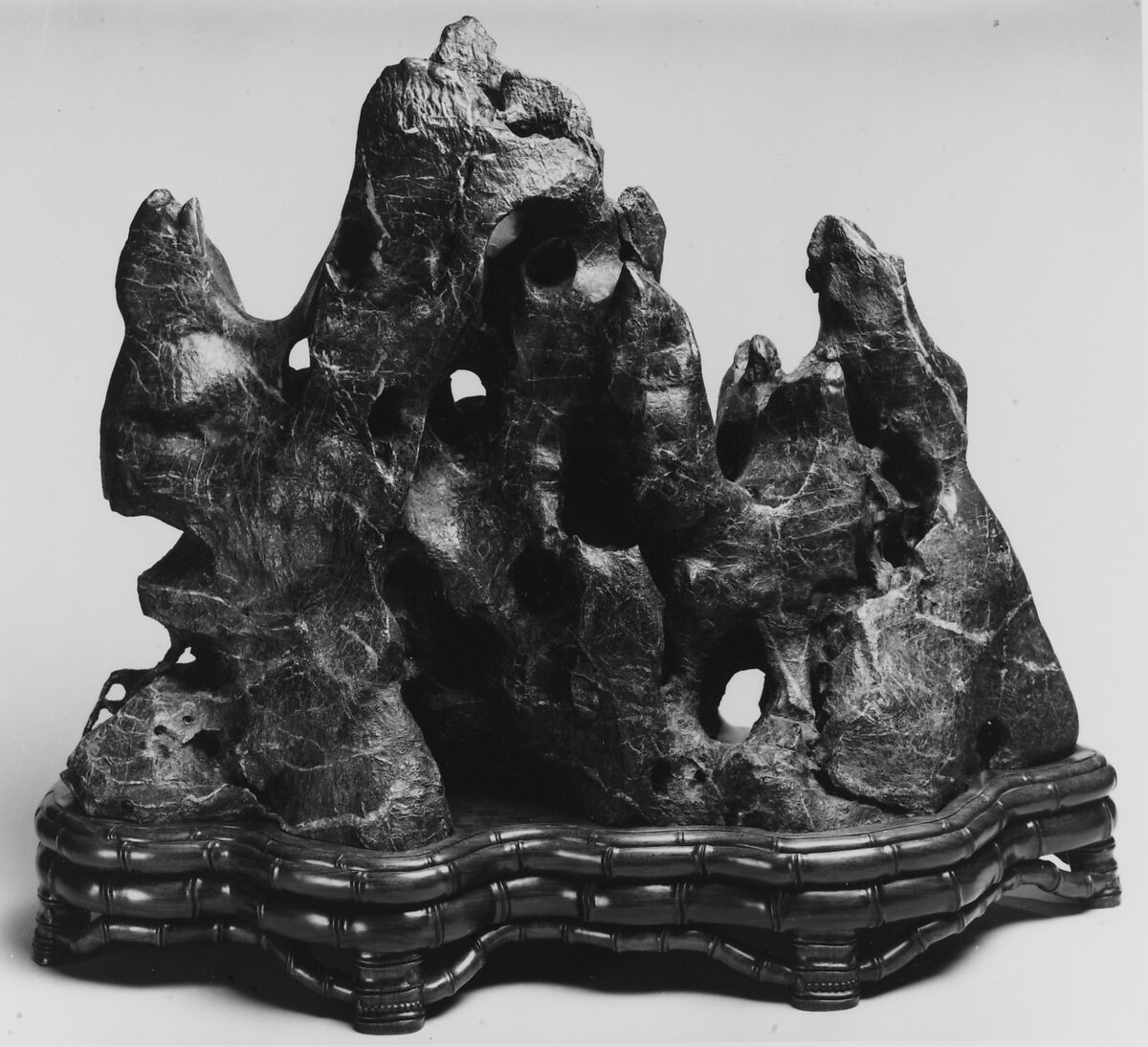 Rock in the Form of a Fantastic Mountain, Black Lingbi limestone; wood stand, China 