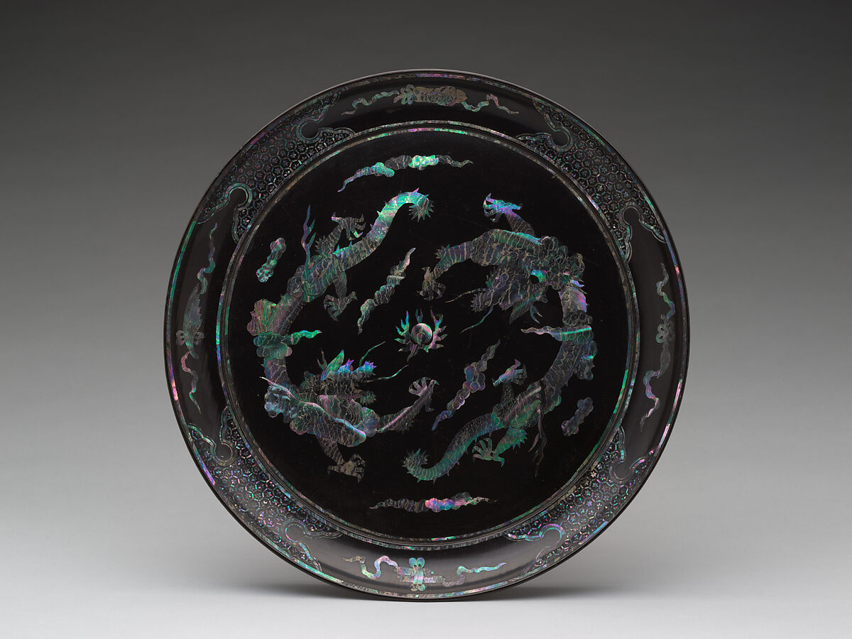 Round tray with decoration of dragons and clouds, Mother-of-pearl inlay on black lacquer, Japan (Ryūkyū Islands) 