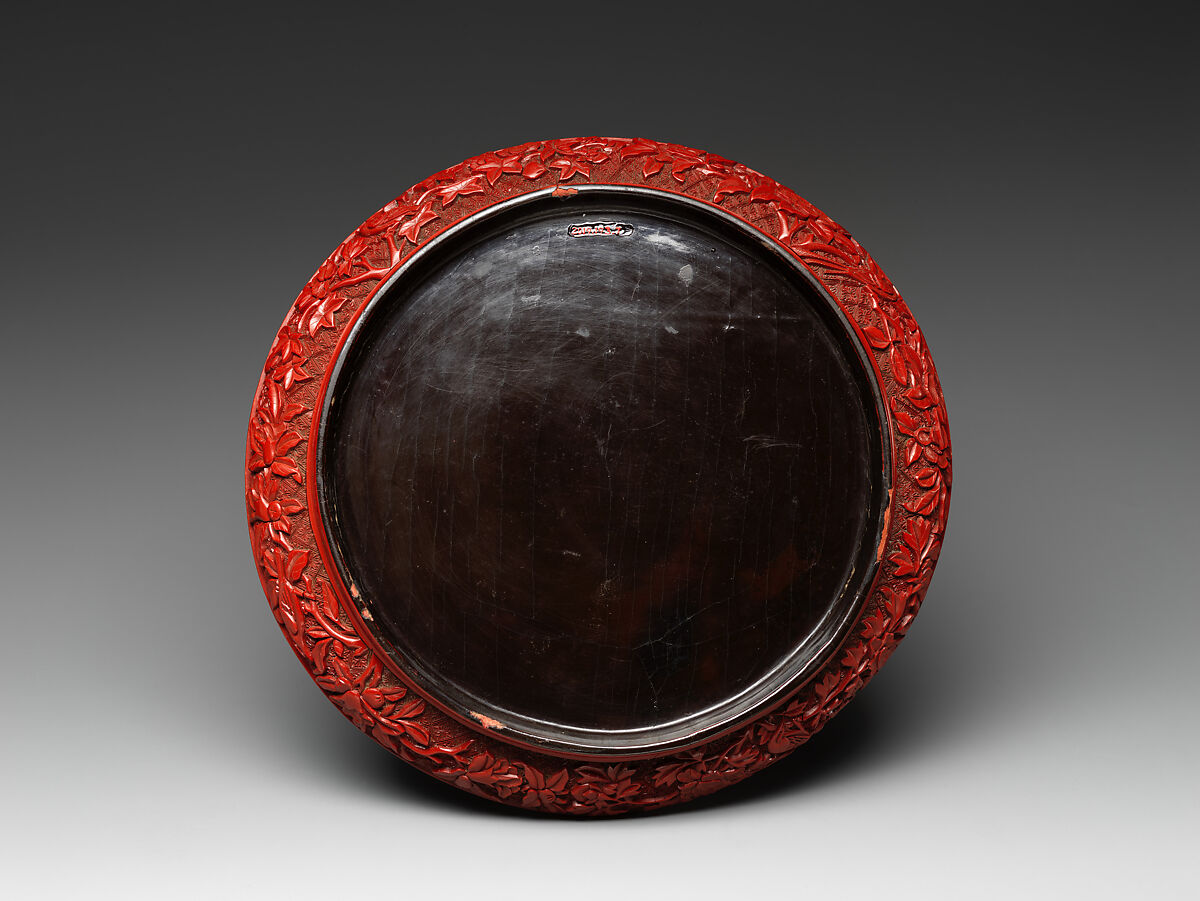 Dish with figures in a landscape, Carved red lacquer, China