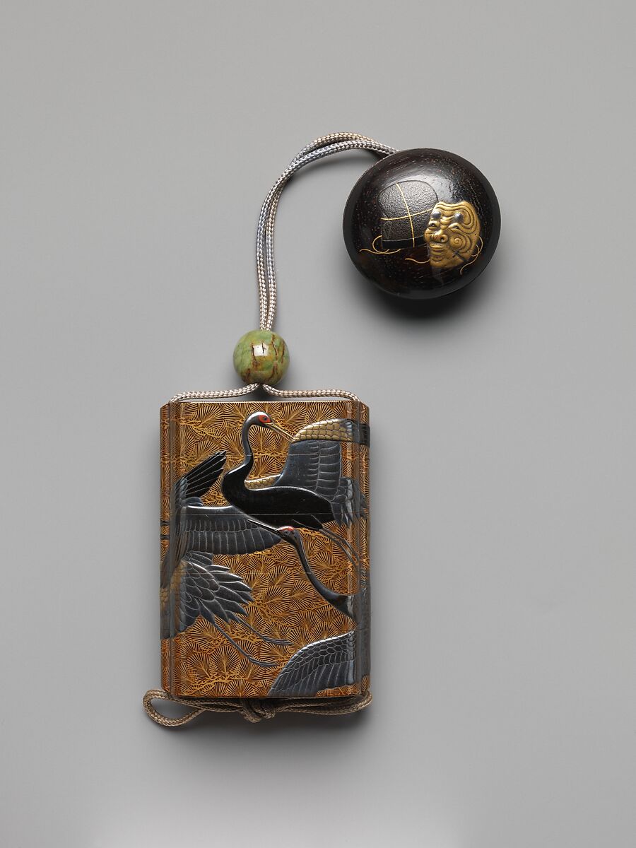 Inrō with Cranes and Pines, Koma Kyūhaku V (Japanese, died 1794), Gold togidashi lacquer ground with gold and silver takamaki-e and hiramaki-e, and black and red lacquerNetsuke: hat and mask; lacquer on wood Ojime: jade bead, Japan 