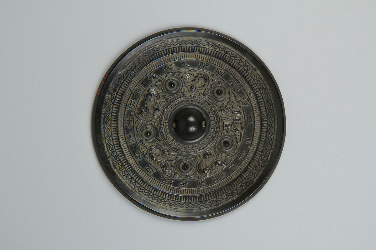 Mirror with deities and mythical creatures, Bronze with black patina, China 