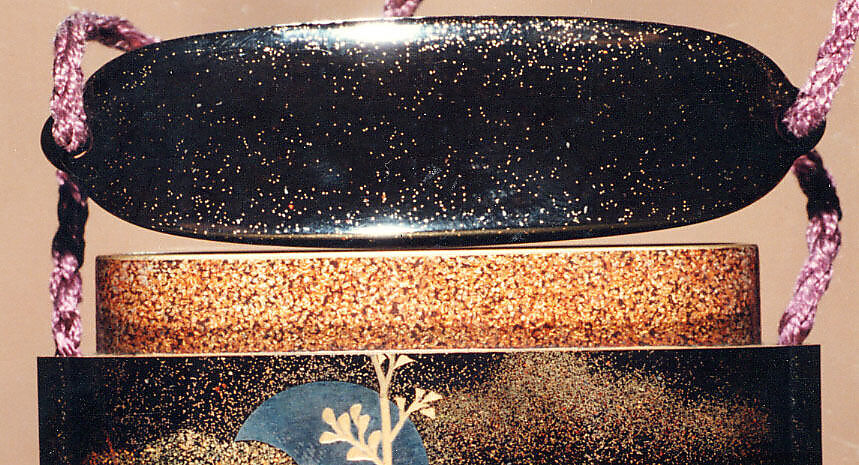 Case (Inrō) with Design of Trees, Crow, and Moon, Takamaki-e with nashiji, gold and silver foil, and silver inlay on black lacquer; Interior: nashiji and fundame; Ojime: bead of inlaid metals and alloys; Netsuke: flowers, moon, and poem in gold lacquer on dark wood (signed: Designed by Hoitsu), Japan