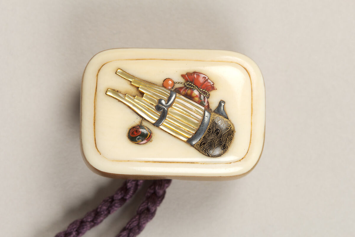 Inrō with Sanbasō Dancers, Four cases; lacquered wood with gold, silver hiramaki-e, togidashimaki-e, and cut-out gold foil on nashiji (“pear-skin”) groundNetsuke: box with mouth organ (shō) and pouch; ivory with inlaysOjime: lacquer bead, Japan