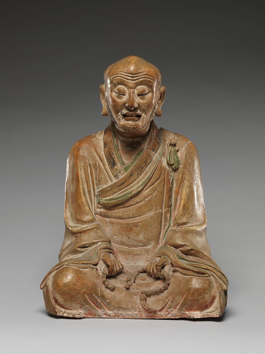 Seated luohan holding a rosary, Stoneware with pigment, China 