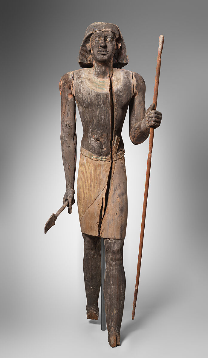 Standing Statue of Mitry with flaring wig, Acacia, paint, gesso 