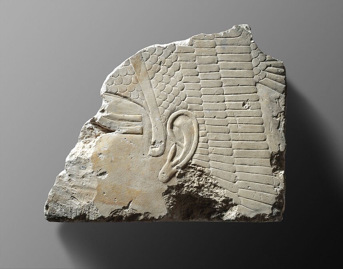 Relief fragment with the head of a goddess, Limestone, paint 