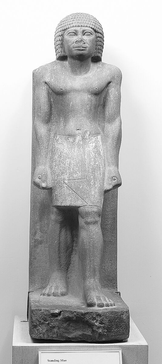 Striding Figure, Quartzite, paint